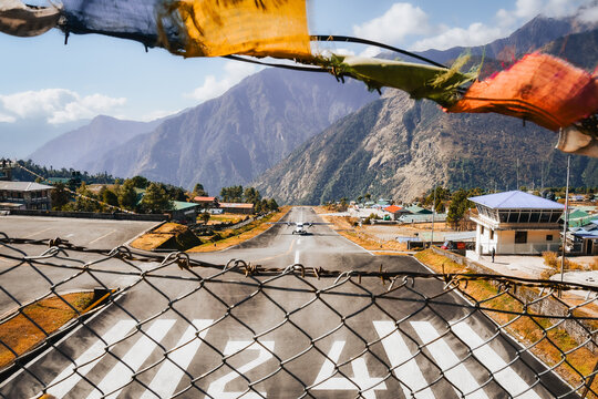 Lukla, Nepal - 14th november, 2023: airplane on runway arrive to Lukla domestic flights Airport. Airport. Town of Lukla. Khumbu Pasanglhamu, Solukhumbu District, Koshi Province