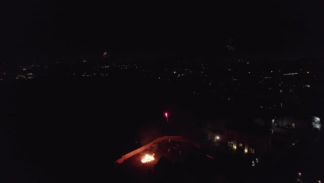 Aerial, cinematic drone footage of Fireworks on bonfire night in the UK.