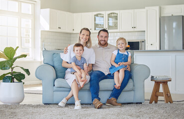 Smile, portrait and family relax on sofa house for bonding, love and care or hug in living room together. Happy, woman and man with children for childhood, support and trust of memory at home