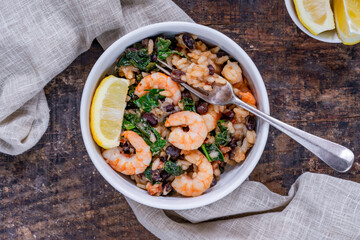 Prawn and chorizo risotto with black beans and calvo nero