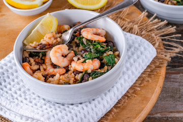 Prawn and chorizo risotto with black beans and calvo nero