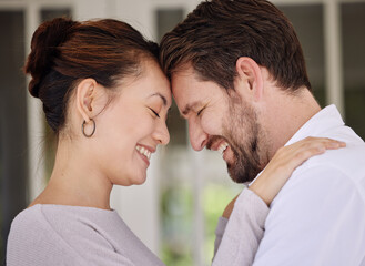 Home, forehead and couple with love, smile and bonding together with happiness, romance or cheerful. People, man and woman with care, marriage or relationship with affection, trust and peace with joy