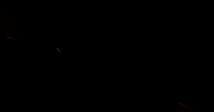 Fire Sparks particles overlay effect on black background. High quality 4k footage