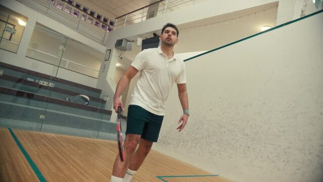 Front view of two squash players