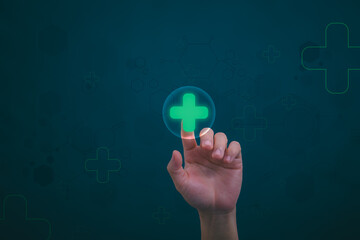 Businessman showing a symbol or icon related to health insurance or healthcare. Concepts for developing and accessing care anywhere, anytime, doing business related to the hospital business