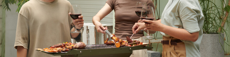Web banner with friends grilling food in backyard