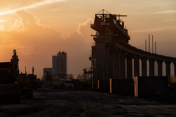 Silhouette  Site construction.   Launcher Gantry crane  on sunset.
 