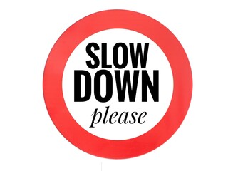A sign with a red circle and the words 'Slow Down please,' serving as a warning to drivers to reduce their speed for safety reasons and to avoid potential dangers