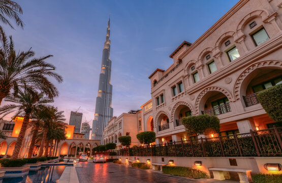 Dubai, UAE - 2018 - Cityscape of Dubai in the sunset time with Burj khalifa in the background and Souk Al Bahar in the foreground 
