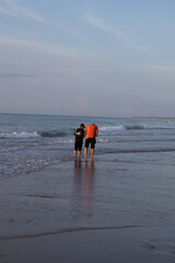 father and son on beach