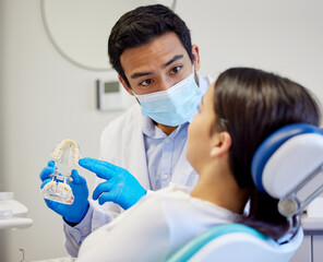 Dentist, patient and explain with teeth occlusion for dental surgery, treatment and oral care. Doctor, healthcare and discussion or consultation for diagnosis, canal procedure and bite registration