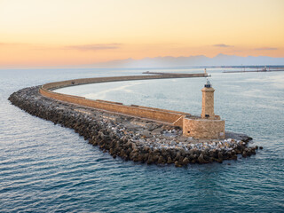  Livorno lighthouse and pier, at the south entrance of the Harbour of Livorno in Tuscany on the...