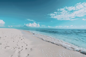 A breathtaking panoramic view of a pristine beach, where the soft white sand meets the sparkling ocean. The perfect spot to relax and unwind.