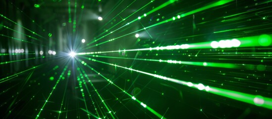 Obraz premium Photo of A green laser beam on black background, with light trails in motion