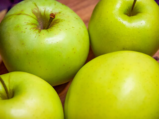 These green apples, ready for consumption, can be featured in cooking or baking guides.