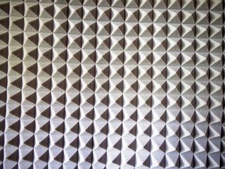 Audio Insulation Foam. Detailed grey foam for noise control in studios.