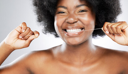 Portrait, smile and black woman flossing with hygiene for healthy gums and plaque build up in...