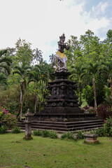 Balinese statue in a garden