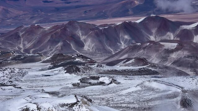 Ojos del Salado highest volcano on Earth captured from aerial perspective. Located in Andes between Chile and Argentina this volcano is testament to majestic and powerful nature of South America.
