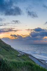 Trimingham beach sunset colours at dusk in portrait orientation