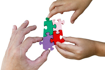 The man and boy hold in hand a jigsaw puzzle. Business solutions, success, and strategy concept.