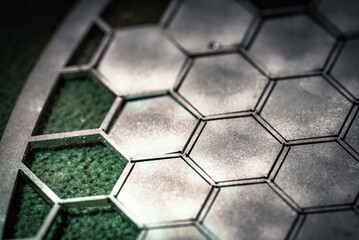 Small pentagons, parts laser cut in metal, close up