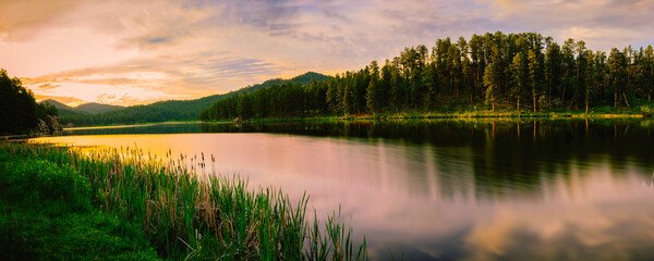 Tranquil Sunrise Panoramic Landscape at Stockade Lake in Custer State Park, South Dakota: The Black Hills Country Summer Skyline and Water Reflections
