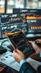 Obraz premium Successful Entrepreneur Analyzing Financial Graphs on Clipboard in Modern Office Setting