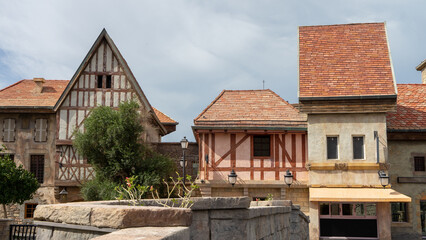 Walking area with shops and restaurants in United Arab Emirates. Riverland, Dubai. Houses in style...