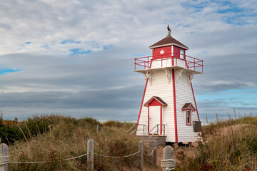 View of a beautiful lighthouse at the Prince Edward National Park, in the Prince Edward Island,...