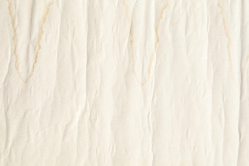 Crumpled yellow background paper texture with lines