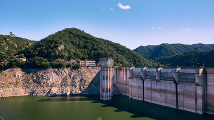 Sau reservoir dam. Water conservation in relation to drought caused by climate change causing water scarcity in Spain and Europe. Girona region, Spain.