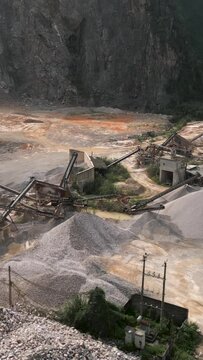 cement factory at the foot of the great mountains where minerals are extracted for subsequent micronization in Hanoi Vietnam