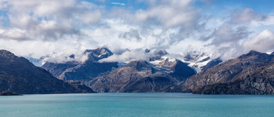 Dramatic Cloudy Morning over Alaska Coast. Nature Background.