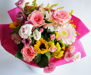 bouquet on white in white vase