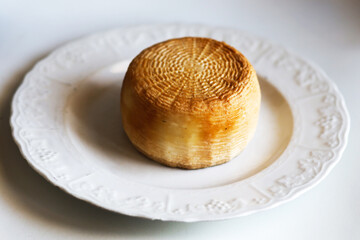 Pecorino Romano in white dish