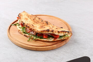 Sandwich pizza with prosciutto
