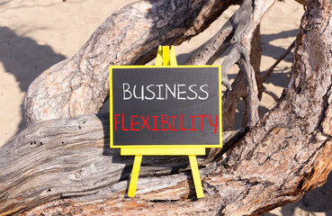 Business flexibility symbol. Concept words Business flexibility on beautiful yellow blackboard....