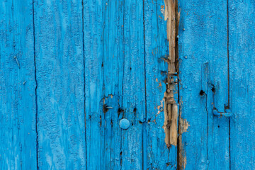 The empty wooden background is blue. Straight lines at different angles, backlight and light gradient. Layout for design or advertising