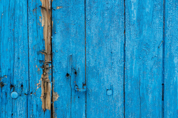 The empty wooden background is blue. Straight lines at different angles, backlight and light gradient. Layout for design or advertising