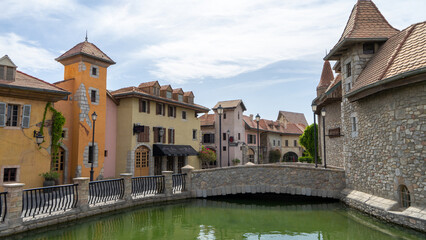 Walking area with shops and restaurants in United Arab Emirates. Riverland, Dubai. Houses in style of medieval Europe