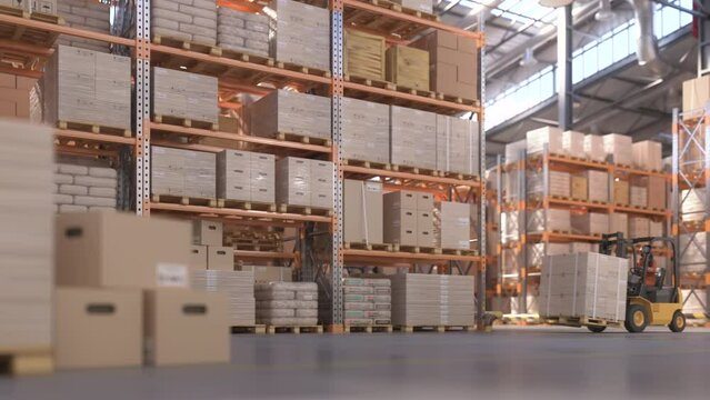 Forklift with cardboard boxes drives through retail warehouse and row of shelves with goods.