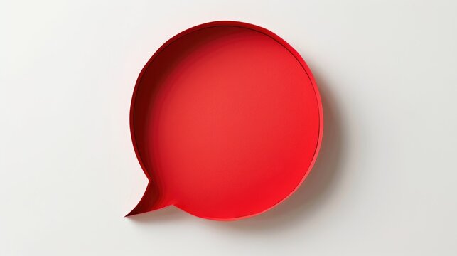 A red speech bubble made of paper on a white background with ample space for text insertion
