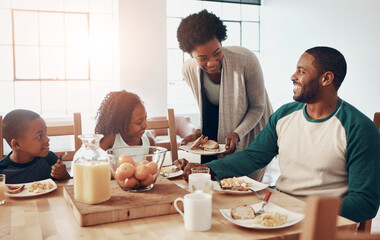 Black family, parents and children for breakfast in home with serving, bonding and happy in dining...