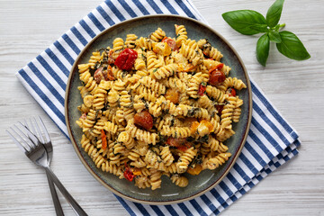 Homemade Baked Boursin Pasta on a Plate, top view. Flat lay, overhead, from above.