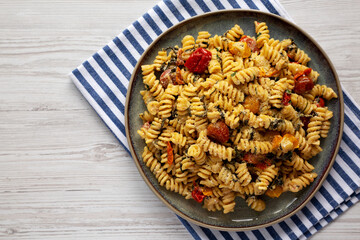 Homemade Baked Boursin Pasta on a Plate, top view. Flat lay, overhead, from above.