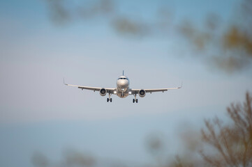 Front image of a commercial airliner about to land. El Prat Airport - Barcelona
