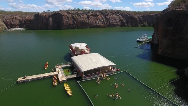 Aerial view of people swimming in the Xing&oacute; C&acirc;nions, formed by waters from the reservoir of the Xing&oacute; Hydroelectric Plant, S&atilde;o Francisco River - Delmiro Gouveia, Alagoas, Brazil