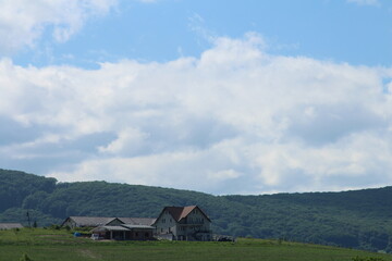 A house in a grassy field