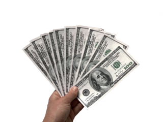 Hand holding American dollars, 100 US dollar banknotes isolated on white background